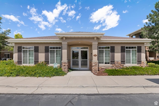 191 E Spencer Peak Way Unit I2, Draper, UT 84020 - doorway to property with stucco siding, stone siding, and french doors