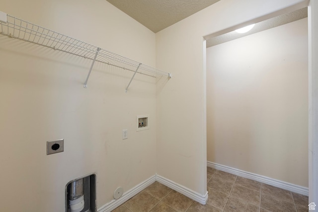 191 E Spencer Peak Way Unit I2, Draper, UT 84020 - washroom with electric dryer hookup, hookup for a washing machine, gas dryer hookup, baseboards, and light tile patterned floors
