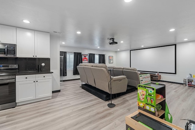 189 N 20 W, Vineyard, UT 84059 - home theater room with light wood-style flooring, recessed lighting, and baseboards