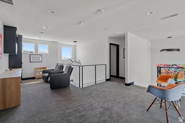 189 N 20 W, Vineyard, UT 84059 - living area with carpet flooring, an upstairs landing, recessed lighting, and baseboards