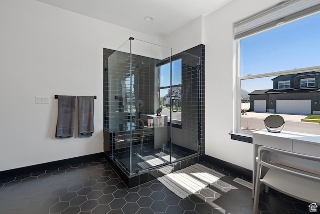 189 N 20 W, Vineyard, UT 84059 - full bathroom featuring plenty of natural light, tile patterned floors, a shower stall, and baseboards