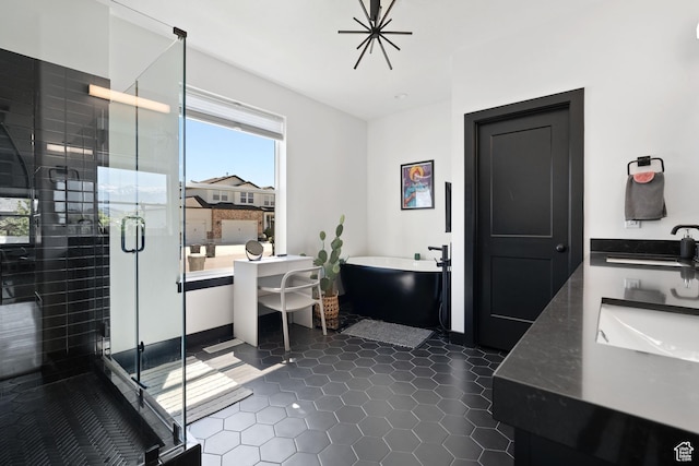189 N 20 W, Vineyard, UT 84059 - bathroom featuring a freestanding bath, tile patterned floors, a shower stall, and double vanity
