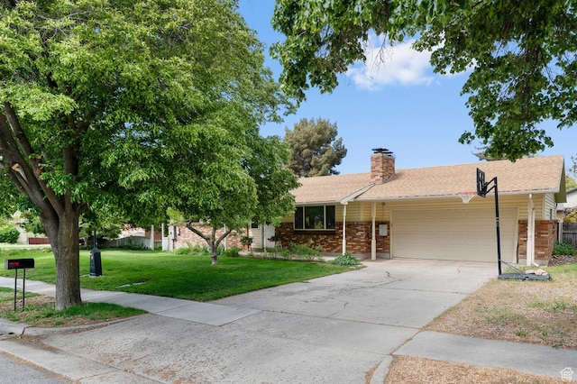 165 N 800 E, American Fork, UT 84003 - view of front of property featuring brick siding, a garage, a front yard, a chimney, and concrete driveway