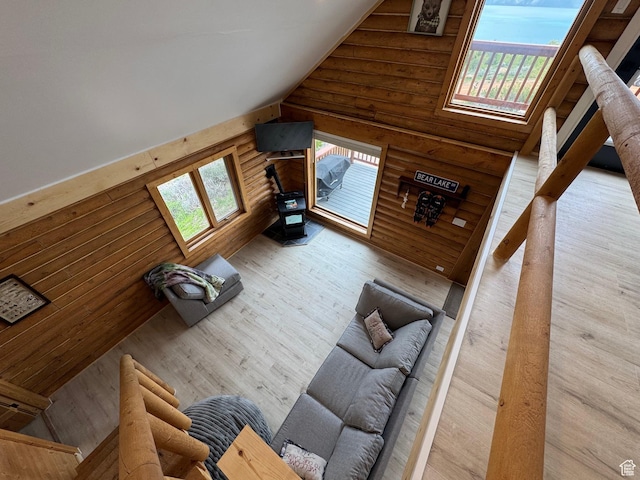 395 Hickock Dr Unit 309, Fish Haven, ID 83287 - living area with wood finished floors, vaulted ceiling, and log walls