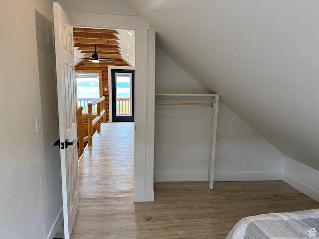 395 Hickock Dr Unit 309, Fish Haven, ID 83287 - unfurnished bedroom with vaulted ceiling, light wood-style flooring, and baseboards