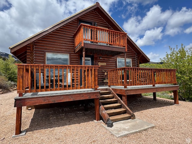 395 Hickock Dr Unit 309, Fish Haven, ID 83287 - back of property featuring a balcony and a wooden deck