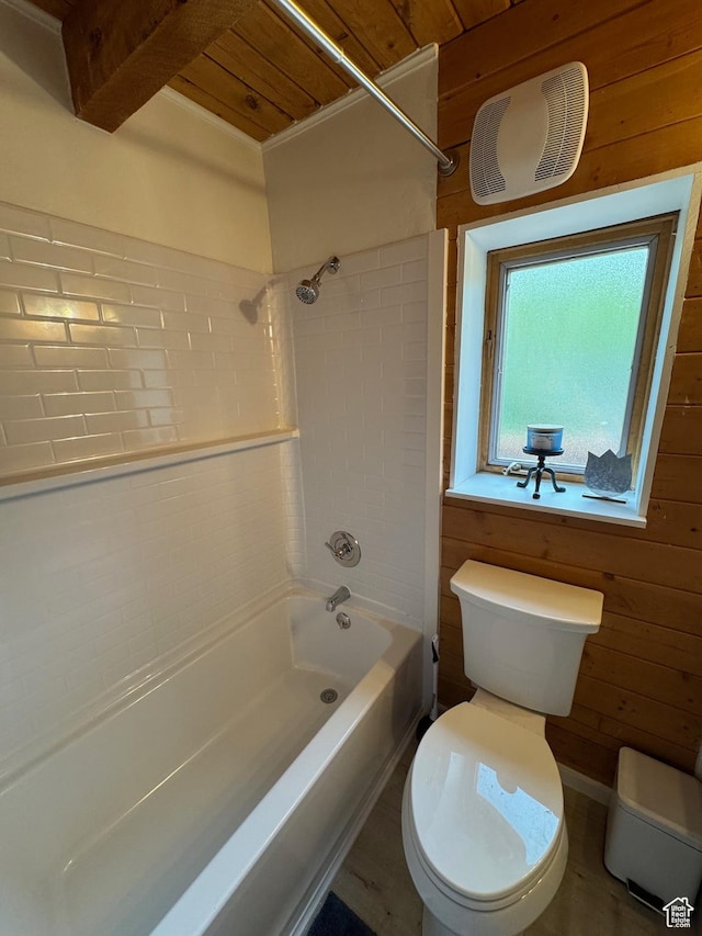 395 Hickock Dr Unit 309, Fish Haven, ID 83287 - bathroom with toilet, shower / bathtub combination, and wooden walls