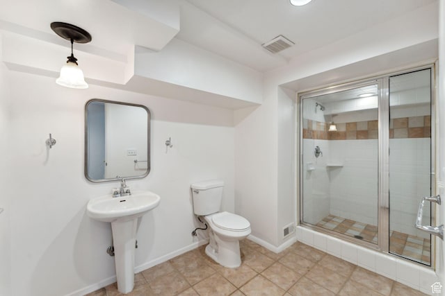1679 Village Round Dr, Park City, UT 84098 - full bathroom featuring toilet, a shower stall, baseboards, a sink, and tile patterned floors