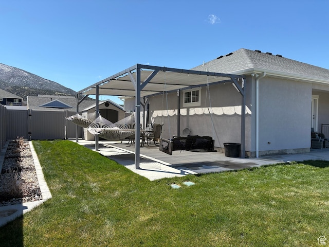 765 E Union St, Manti, UT 84642 - rear view of house with a patio, stucco siding, and a mountain view
