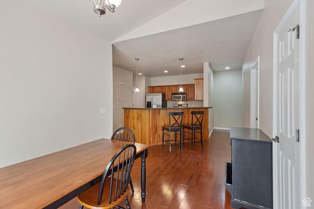 1183 S Canyon Meadow Dr Unit 2, Provo, UT 84606 - dining space featuring dark wood-style flooring, vaulted ceiling, and recessed lighting