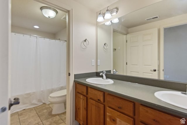 1183 S Canyon Meadow Dr Unit 2, Provo, UT 84606 - bathroom featuring toilet, double vanity, tile patterned floors, and shower / tub combo with curtain