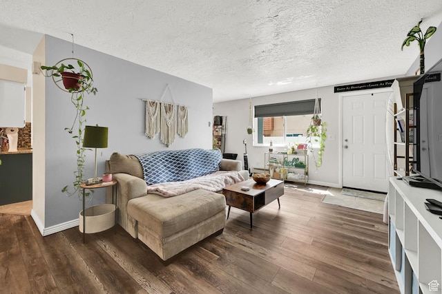 720 S 1650 E Unit B, Clearfield, UT 84015 - living room with dark wood-type flooring, a textured ceiling, and baseboards