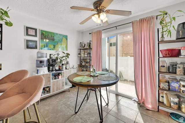 720 S 1650 E Unit B, Clearfield, UT 84015 - tiled dining room with a ceiling fan and a textured ceiling