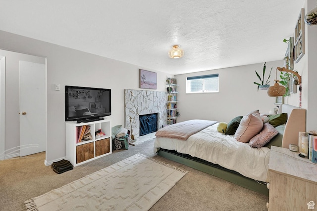 720 S 1650 E Unit B, Clearfield, UT 84015 - carpeted bedroom featuring a textured ceiling and a fireplace