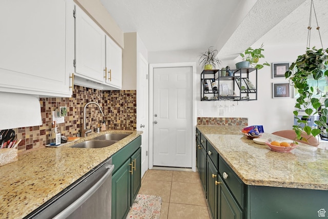720 S 1650 E Unit B, Clearfield, UT 84015 - kitchen with a sink, green cabinetry, dishwasher, white cabinetry, and tasteful backsplash