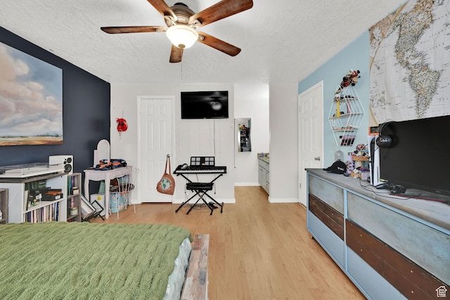 720 S 1650 E Unit B, Clearfield, UT 84015 - bedroom with a textured ceiling, light wood-style floors, and baseboards