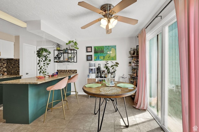 720 S 1650 E Unit B, Clearfield, UT 84015 - dining area featuring ceiling fan and light tile patterned flooring