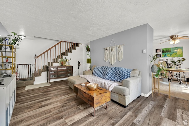 720 S 1650 E Unit B, Clearfield, UT 84015 - living area featuring wood finished floors, stairs, ceiling fan, a textured ceiling, and baseboards