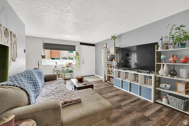 720 S 1650 E Unit B, Clearfield, UT 84015 - living room with wood finished floors, a textured ceiling, and baseboards