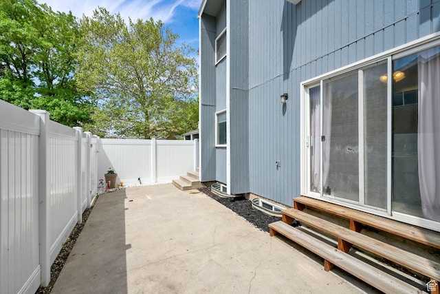 720 S 1650 E Unit B, Clearfield, UT 84015 - fenced backyard featuring entry steps and a patio