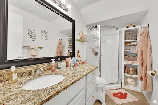 720 S 1650 E Unit B, Clearfield, UT 84015 - bathroom with vanity, a shower stall, toilet, tile patterned floors, and lofted ceiling
