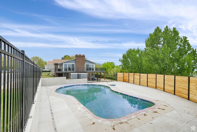 720 S 1650 E Unit B, Clearfield, UT 84015 - view of swimming pool featuring a patio area and a fenced backyard