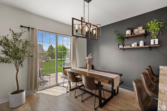 152 S 930 E, American Fork, UT 84003 - dining room with a chandelier, wood finished floors, and baseboards