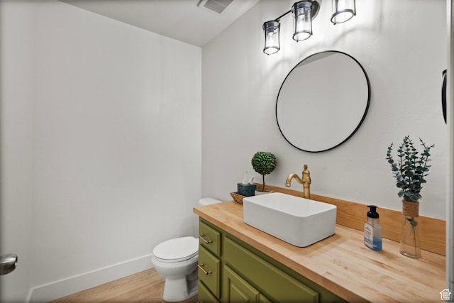 152 S 930 E, American Fork, UT 84003 - bathroom featuring toilet, wood finished floors, vanity, and baseboards
