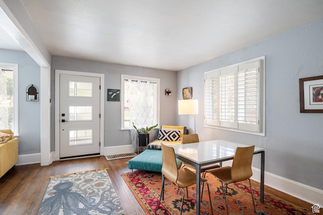 1190 E Sherman Ave S, Salt Lake City, UT 84105 - dining room with plenty of natural light, hardwood / wood-style flooring, and baseboards