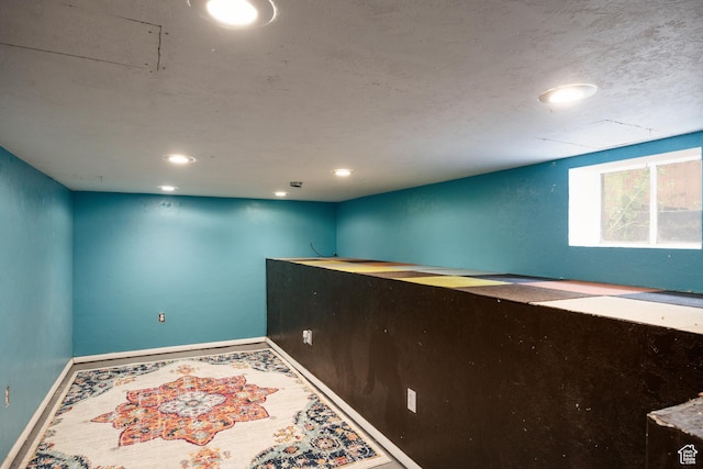 1190 E Sherman Ave S, Salt Lake City, UT 84105 - empty room featuring baseboards, carpet floors, and recessed lighting