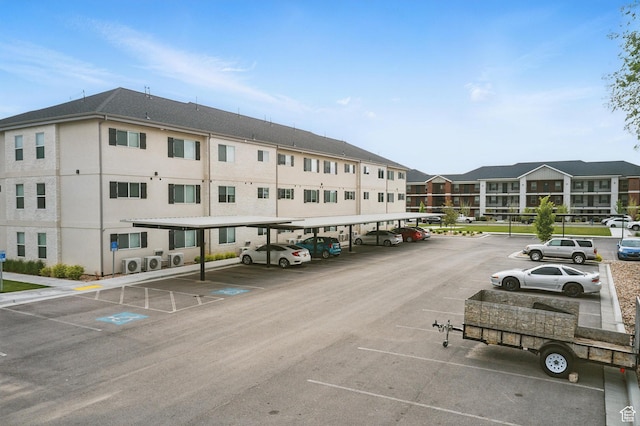 64 W 600 S Unit C205, Springville, UT 84663 - view of building exterior featuring covered parking