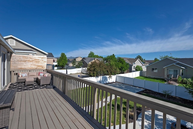 4952 W Buffalo Ct S, Riverton, UT 84096 - wooden terrace featuring a residential view, outdoor lounge area, and a fenced backyard