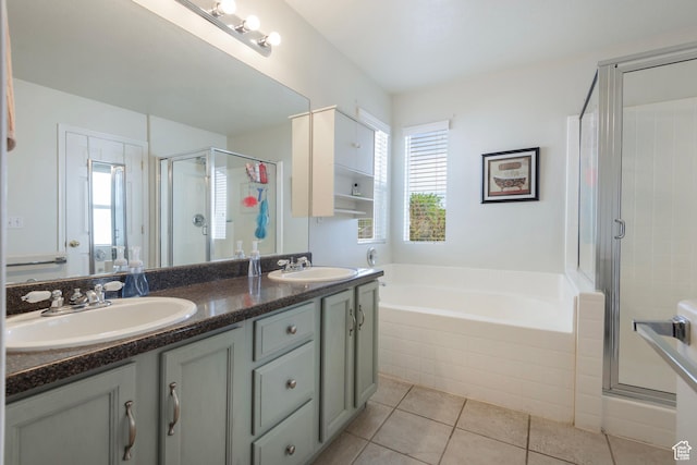 4952 W Buffalo Ct S, Riverton, UT 84096 - bathroom with a stall shower, tile patterned floors, double vanity, and a garden tub