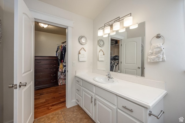 455 N 100 W Unit C-80, Kamas, UT 84036 - bathroom with vanity, a spacious closet, and tile patterned flooring