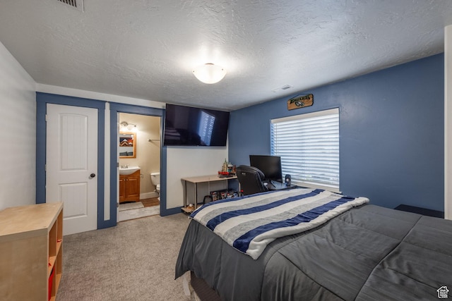 455 N 100 W Unit C-80, Kamas, UT 84036 - bedroom featuring light carpet, a textured ceiling, and ensuite bathroom