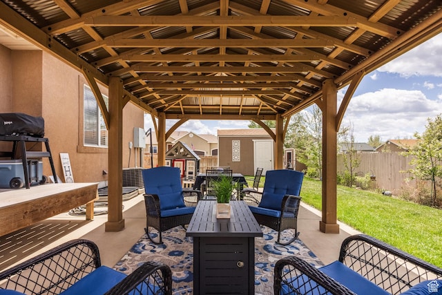 455 N 100 W Unit C-80, Kamas, UT 84036 - fenced backyard with a patio area, outdoor lounge area, and an outdoor structure