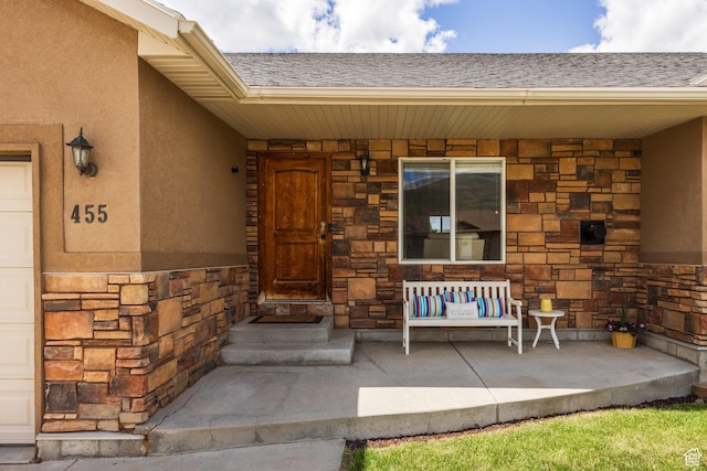 455 N 100 W Unit C-80, Kamas, UT 84036 - property entrance with stone siding, roof with shingles, and covered porch