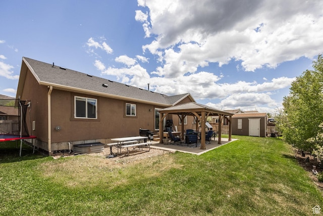 455 N 100 W Unit C-80, Kamas, UT 84036 - rear view of property with a trampoline, a gazebo, a patio, and a lawn
