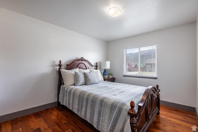 455 N 100 W Unit C-80, Kamas, UT 84036 - bedroom featuring baseboards and dark wood finished floors