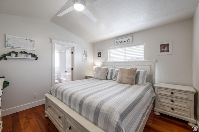 455 N 100 W Unit C-80, Kamas, UT 84036 - bedroom with vaulted ceiling, dark wood-style flooring, ensuite bath, baseboards, and ceiling fan