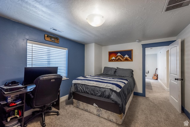 455 N 100 W Unit C-80, Kamas, UT 84036 - bedroom featuring a textured ceiling, carpet, baseboards, and an office area