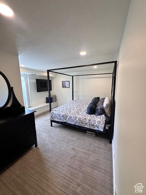 875 S Donner Way E Unit 208, Salt Lake City, UT 84108 - bedroom with carpet and recessed lighting