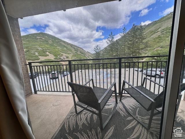 875 S Donner Way E Unit 208, Salt Lake City, UT 84108 - balcony featuring a mountain view