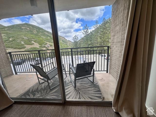 875 S Donner Way E Unit 208, Salt Lake City, UT 84108 - balcony with a mountain view
