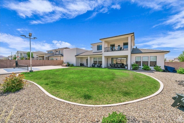 2725 E Ashwood Ln, St George, UT 84790 - back of house featuring a balcony, stucco siding, a patio area, and an outdoor hangout area