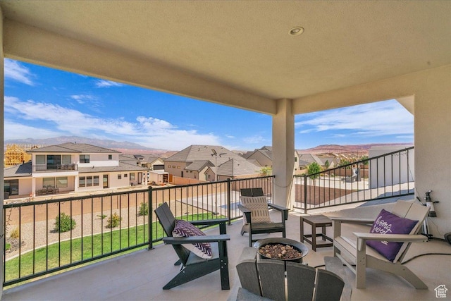 2725 E Ashwood Ln, St George, UT 84790 - balcony with a residential view and an outdoor fire pit