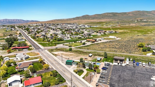 2226 W 1000 N, Tremonton, UT 84337 - aerial view of property and surrounding area with a mountain backdrop and nearby suburban area