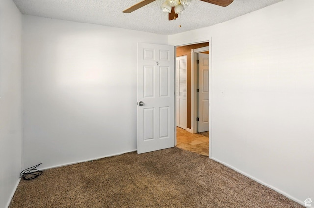2226 W 1000 N, Tremonton, UT 84337 - empty room featuring a ceiling fan, carpet floors, and a textured ceiling