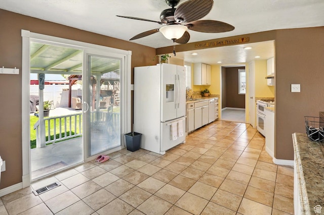 2226 W 1000 N, Tremonton, UT 84337 - kitchen with white appliances, a sink, ceiling fan, light countertops, and light tile patterned floors