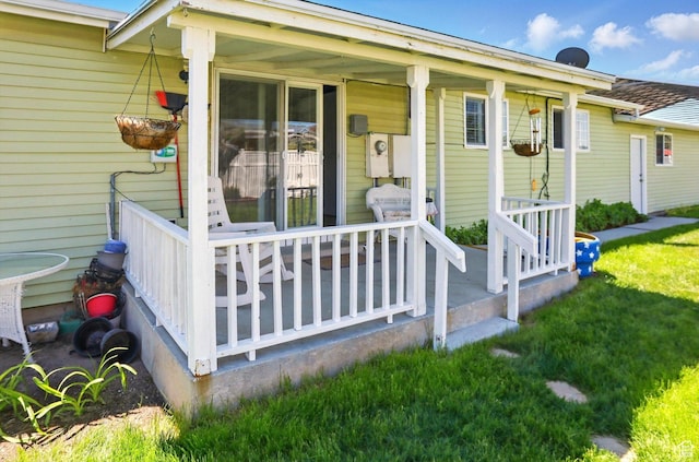 2226 W 1000 N, Tremonton, UT 84337 - doorway to property featuring covered porch and a yard